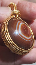 Load image into Gallery viewer, ✨ In-House Handmade Wire Wrapped Tibetan Red Eye Agate Pendant✨
