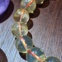 Load image into Gallery viewer, Blue Needle in Citrine Bracelet
