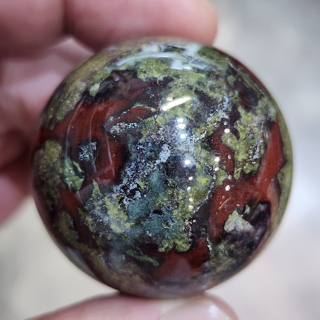 🐉 Dragon Blood Jasper Sphere –  Strength, Courage & Healing