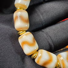 Load image into Gallery viewer, Tibetan Tiger Tooth White Agate Dzi Bracelet – 西藏虎牙白玛瑙天珠手链

