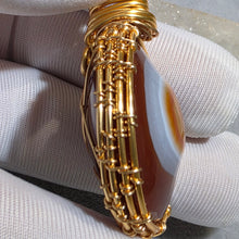 Load image into Gallery viewer, Tibetan Red Eye Agate Wire Wrapped Pendant – 西藏红眼玛瑙绕线吊坠
